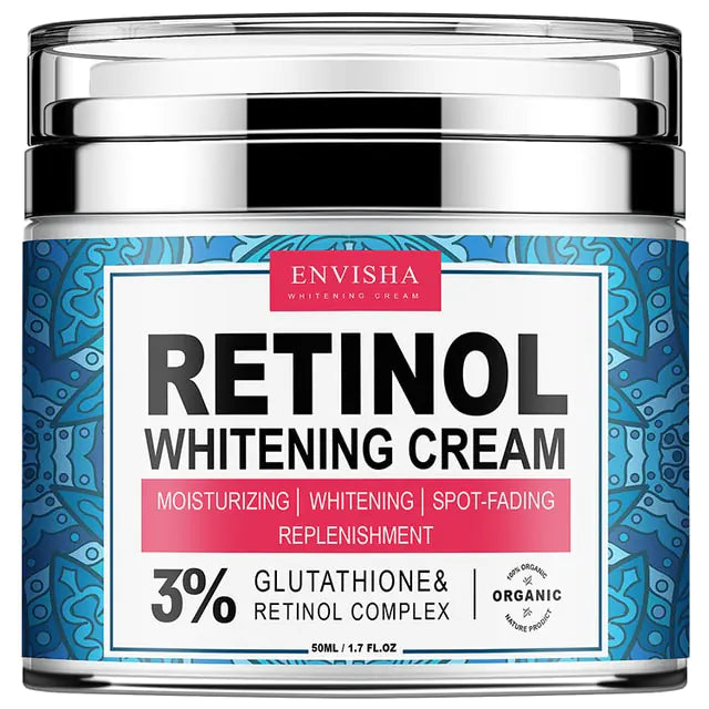 Blå burk med silvrigt lock, etikett med märket Envisha och att det är Retinol uppljusnings kräm i burken samt glutation och retinol komplex. Organiskt märke. Texten är på engelska